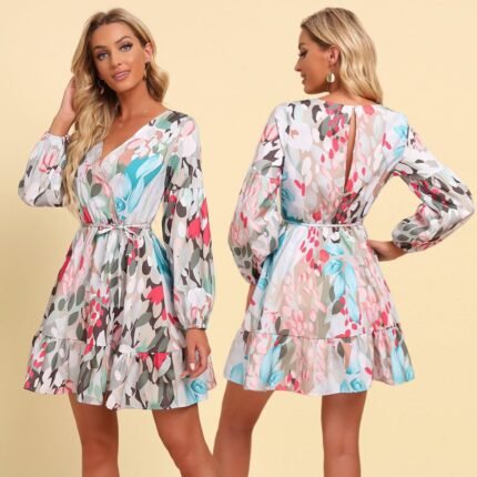 "Floral print boho mini dress with long sleeves and a cinched waist tie"