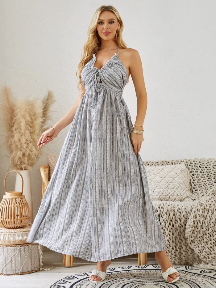 Bohemian Halter Maxi Dress in a striped pattern, featuring a halter neckline and flowy silhouette.