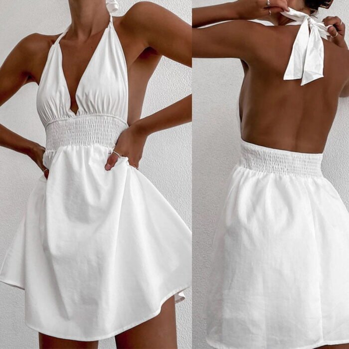 "White halter backless mini dress with smocked waist and tie-back detail"