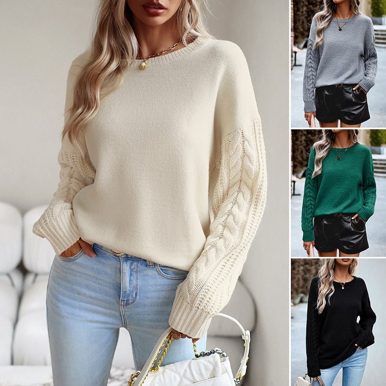 Relaxed-fit cable knit sweater in gray, styled with leather shorts