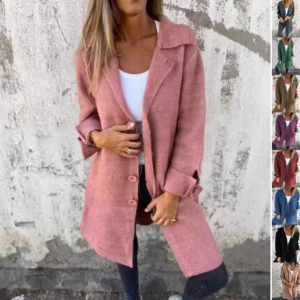 Oversized wool blend coat in green, styled casually with denim and sneakers.