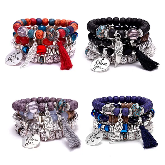 "Royal blue beaded bracelet set with elephant charm and heart accents." "Ruby red beaded bracelet set with tassel detail and gold-tone accents." "Earthy black beaded bracelet set with natural wood beads and leaf charm."