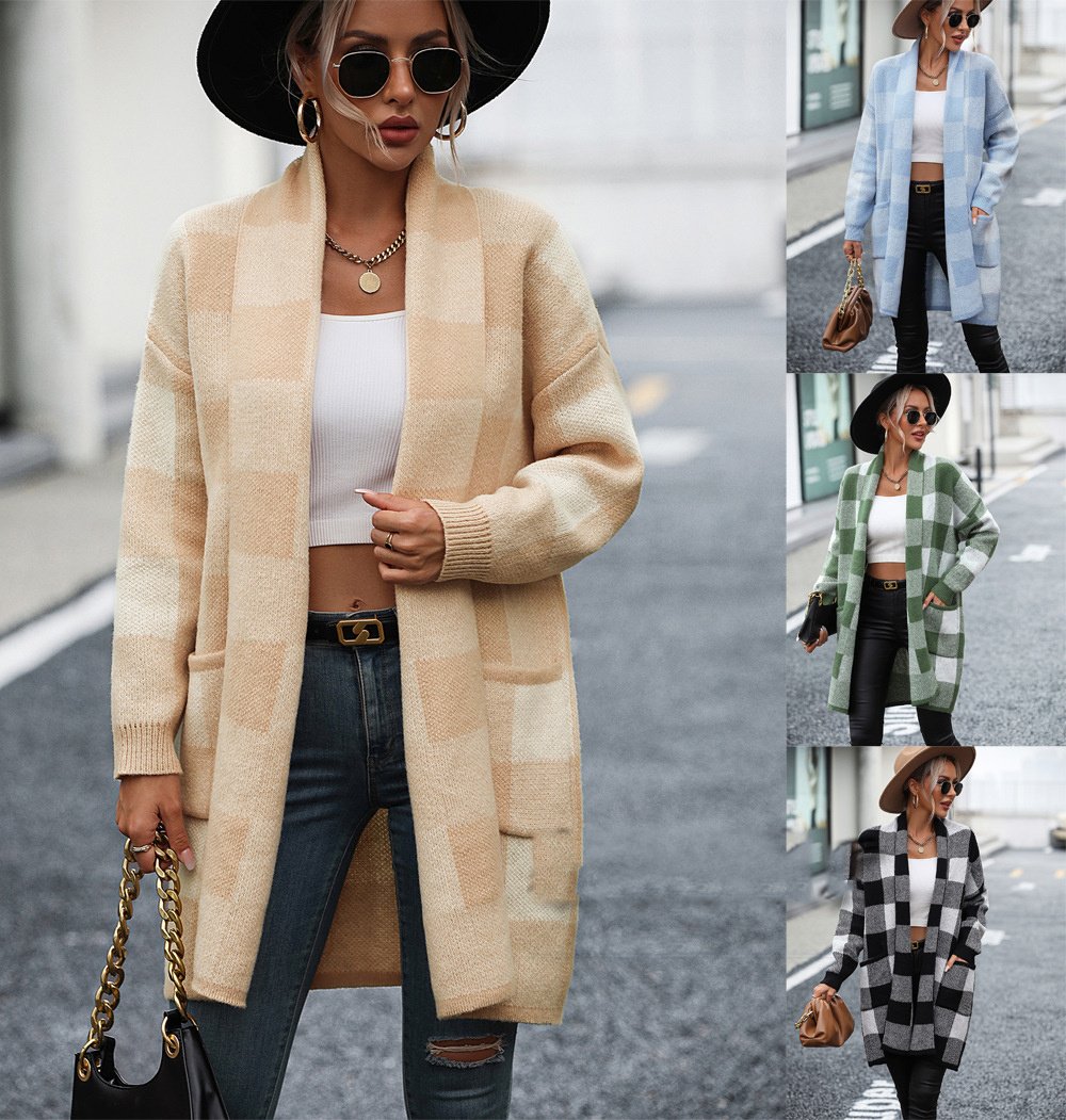 A stylish plaid open-front cardigan in black and white, paired with a chic streetwear outfit.