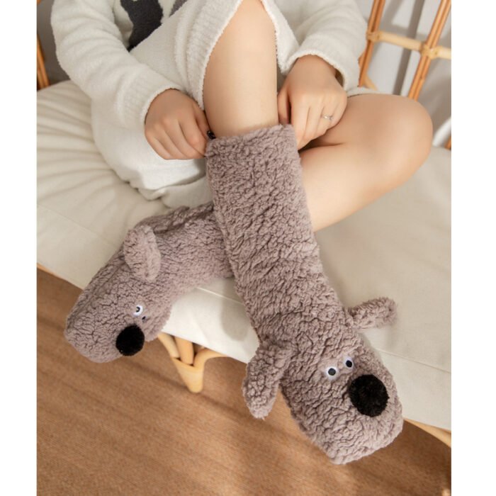 Knee-high dog-themed plush slippers in black with floppy ears