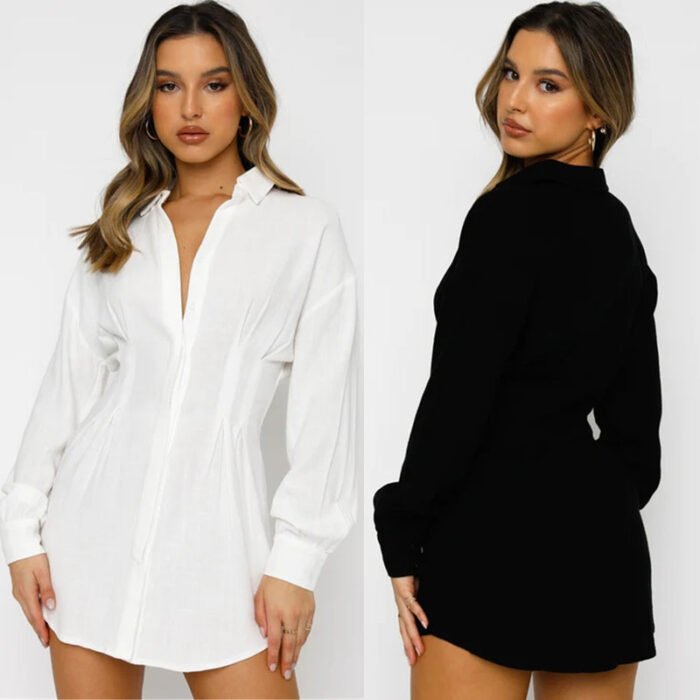 Sleek satin shirt dress with button-down front and long sleeves, perfect for versatile styling.