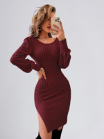 Woman wearing a knitted backless sweater dress with lace detailing and high waist