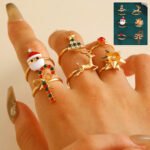 "Festive holiday charm ring set with six Christmas-themed adjustable gold-tone rings."