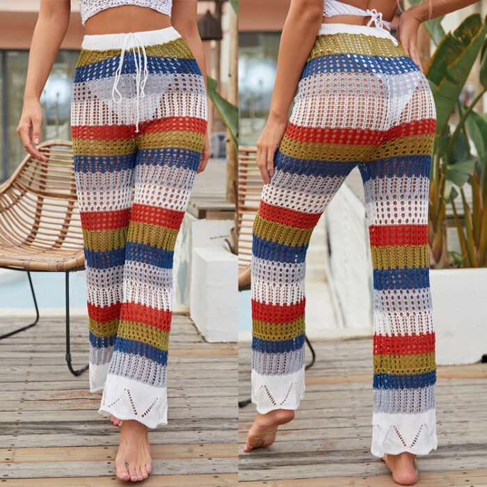 "Boho striped crochet beach pants with multicolored stripes in blue, red, and white."