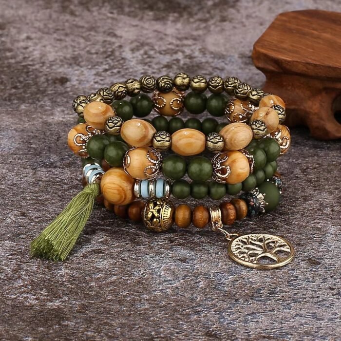 "Handcrafted boho bracelet set featuring wooden beads, tassels, and a Tree of Life charm in vibrant colors."