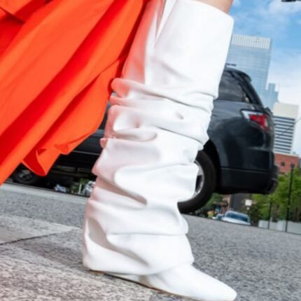 Iconic Slouchy High Heel Boots in vibrant colors with high heel, pointed toe, and slouchy oversleeve style.