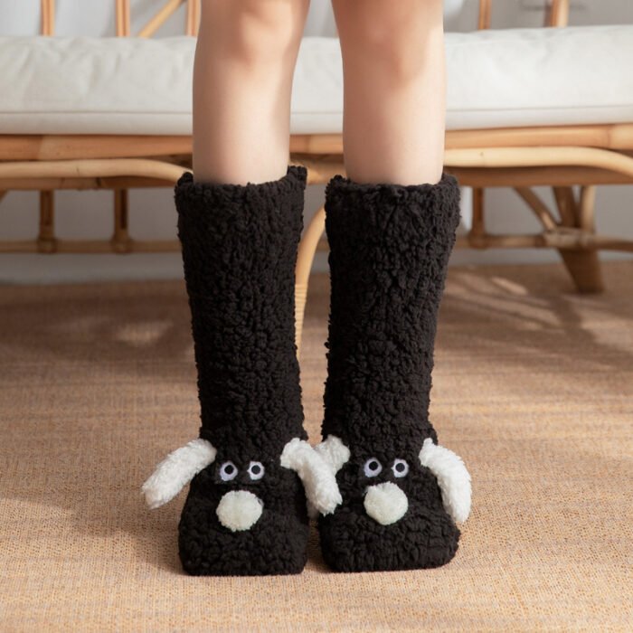 Knee-high dog-themed plush slippers in black with floppy ears