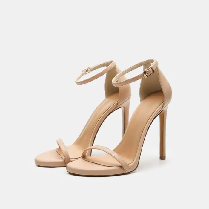 "Classic nude stiletto heels with ankle strap and 4-inch heel."