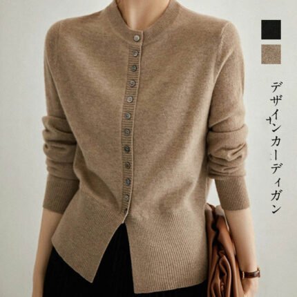 Close-up of the Classic Button-Down Cashmere Cardigan in beige with button detailing and ribbed hem.
