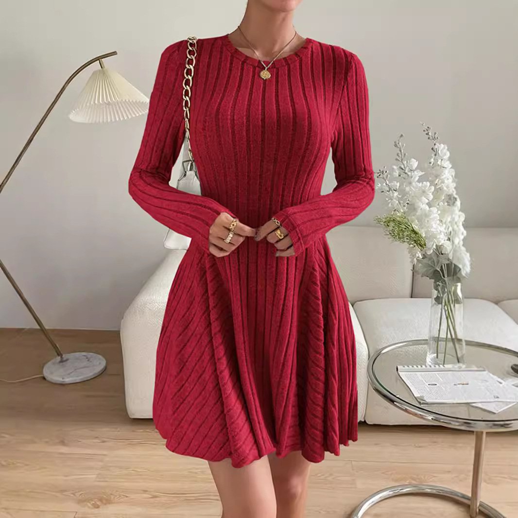 Front view of the ribbed knit long-sleeve skater dress in ruby red.