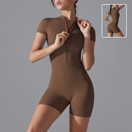 Model wearing a deep maroon zip-up active romper, showing a sculpted fit. Another model styled in a charcoal gray romper, posed for an athletic aesthetic.