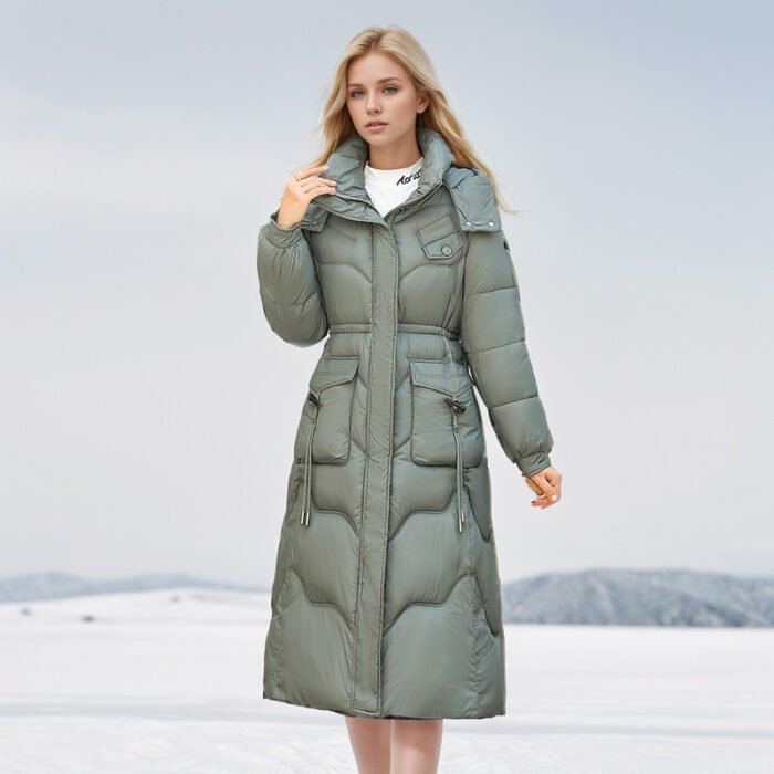 Model wearing a coffee brown quilted puffer coat, holding a coffee cup. Another model in a bold red version, styled effortlessly for winter.