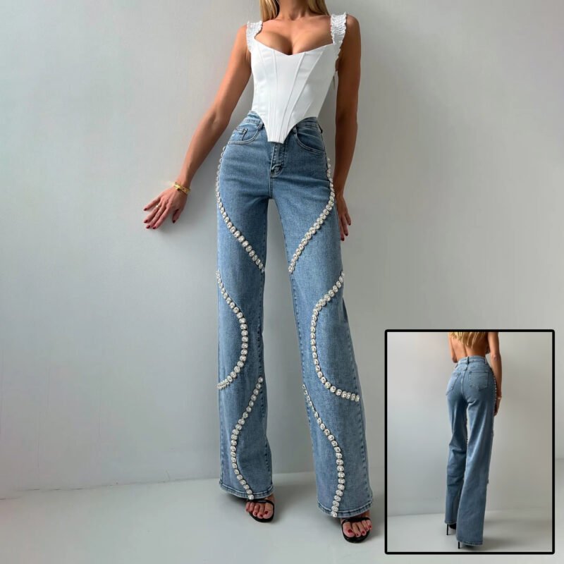 Pearl-embellished wide-leg jeans with wavy design on a model wearing a white corset top.