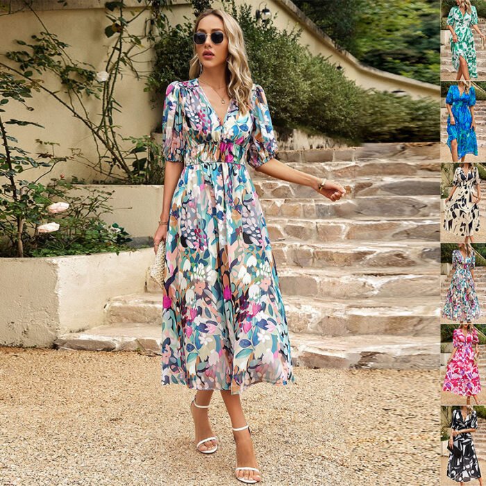 A model twirling in the Florence Puff-Sleeve Floral Midi Dress at a garden party.