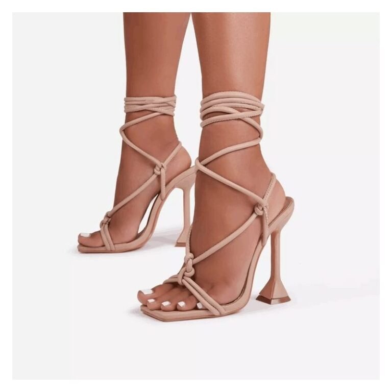 Strappy lace-up high heels with a geometric stiletto heel and square toe in black, nude, and pink.
