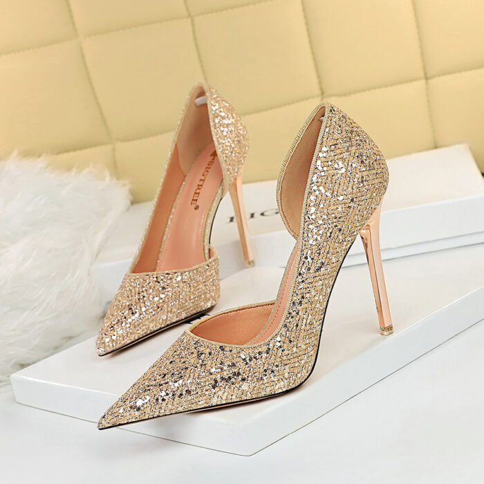 Sparkling glitter stiletto heels with a pointed-toe design and metallic finish—available in silver and gold for a glamorous statement.