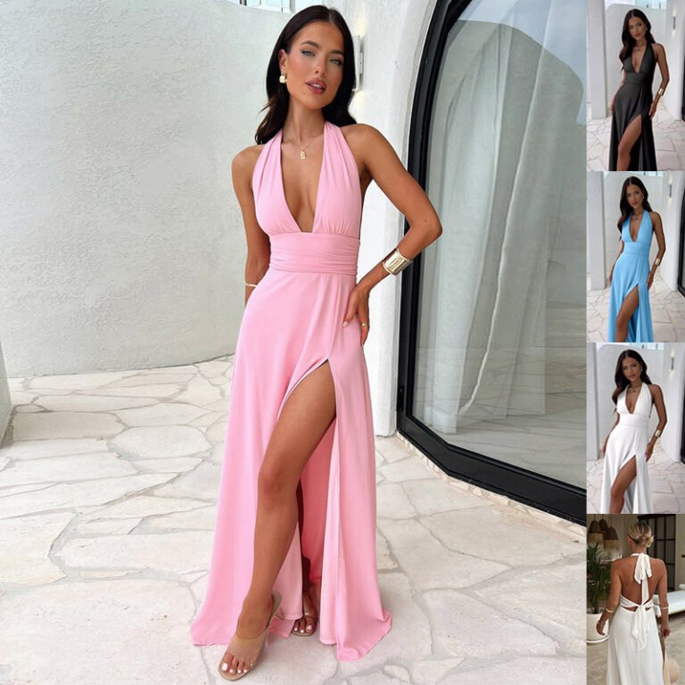 A model wearing the Evelyn Plunge Halter Maxi Dress in pink, featuring a deep V-neck, a cinched waist, and a high-slit flowing skirt