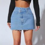 Trendy high-waisted distressed denim mini skirt with a frayed hem, perfect for casual-chic styling.
