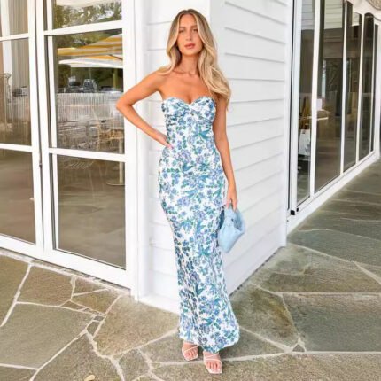Strapless satin floral maxi dress with a figure-hugging silhouette, sweetheart neckline, and romantic print, perfect for summer occasions.