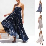Flowy boho maxi dress with spaghetti straps and an abstract artistic print, perfect for summer and casual outings.