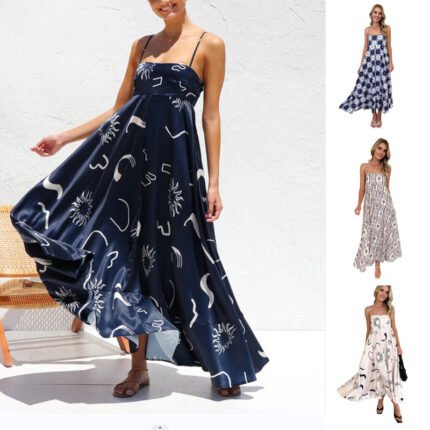 Flowy boho maxi dress with spaghetti straps and an abstract artistic print, perfect for summer and casual outings.