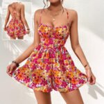 Floral backless romper with lace-up detail, spaghetti straps, and a flowy, breezy silhouette—perfect for summer adventures.