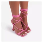 Rose red lace-up sandals with square toes and sculpted heels