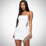 Woman in black rhinestone slit bodycon mini dress Back view of blush pink rhinestone slit dress Front view of red slit sparkle mini dress White sparkle mini dress with side rhinestone detail