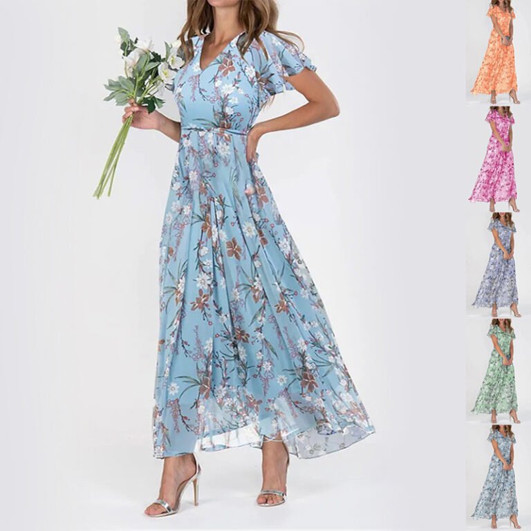 Model wearing light blue floral chiffon maxi dress with flutter sleeves and silver heels
