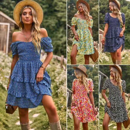 Woman wearing blue off-shoulder floral mini dress in a garden