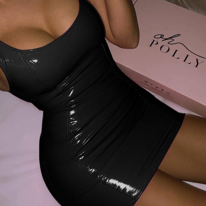 Woman in blue latex-look mini bodycon dress front view