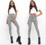 Models wearing plaid high-waisted pants in black and white checkered, red plaid, and yellow tartan prints, paired with white sneakers.