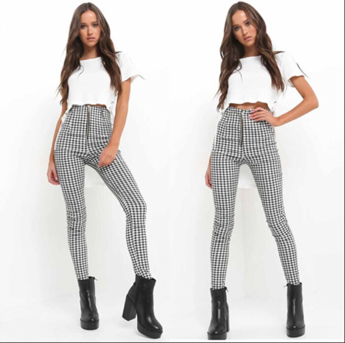 Models wearing plaid high-waisted pants in black and white checkered, red plaid, and yellow tartan prints, paired with white sneakers.