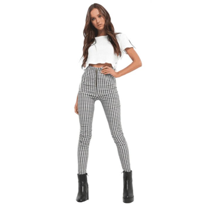 Models wearing plaid high-waisted pants in black and white checkered, red plaid, and yellow tartan prints, paired with white sneakers.