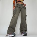 Streetwear cargo pants styled with sneakers and cropped top