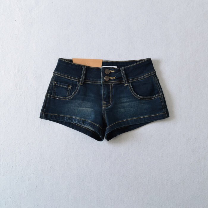 Model wearing ultra-short denim shorts and black tank top