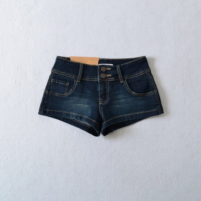 Model wearing ultra-short denim shorts and black tank top