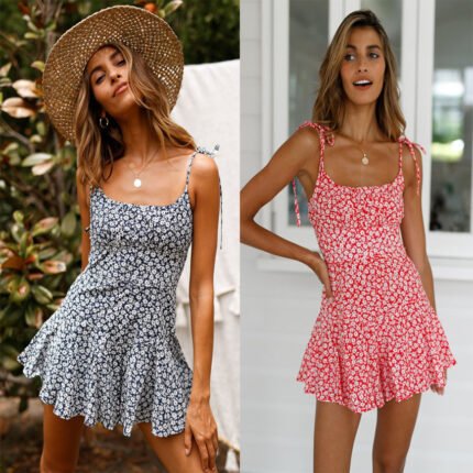 Woman wearing a floral ruffle mini dress with tie straps, styled for summer.