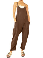 Relaxed fit sleeveless jumpsuit with pockets in neutral tones, styled with sneakers for casual wear.