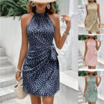 Women’s halter mini dress with polka dot print and wrap waist tie in navy, sage green, khaki, and blush pink.