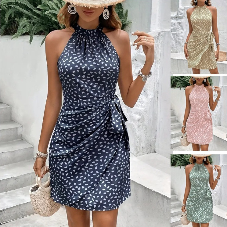 Women’s halter mini dress with polka dot print and wrap waist tie in navy, sage green, khaki, and blush pink.