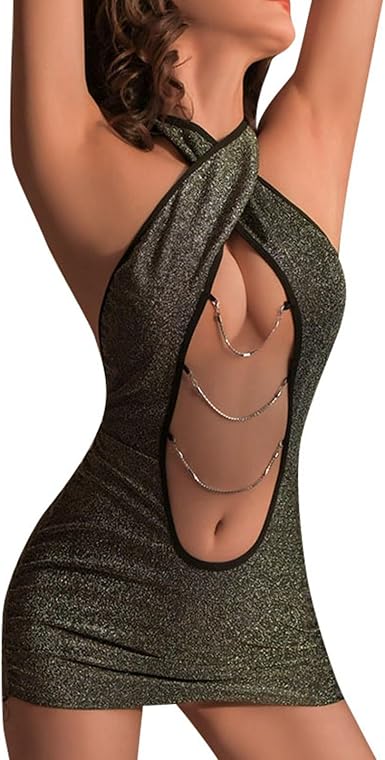 Model wearing a halter cutout mini dress with a crossover neckline, draped chain accents, open back, and fitted mini silhouette.