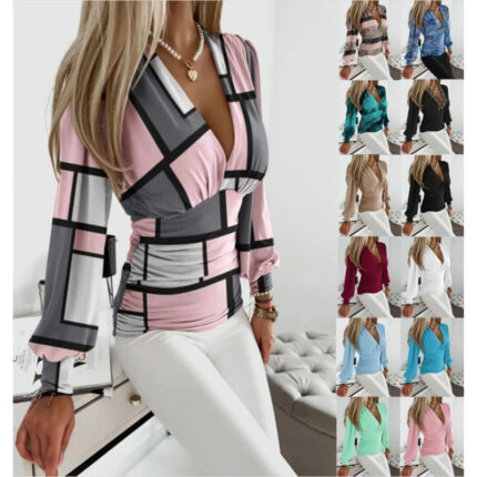 Women’s draped V-neck long sleeve polyester top with ruched waist shown in pink and gray geometric print with multiple color options